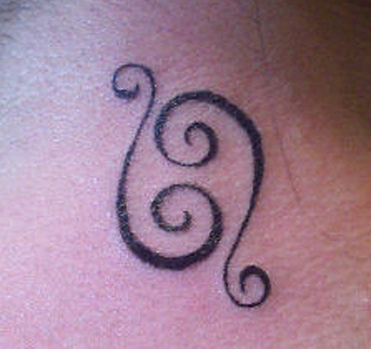 Cancer sign tattoo for under baileys name