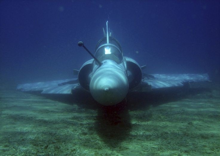 Fighter jet rises from the bottom of the sea