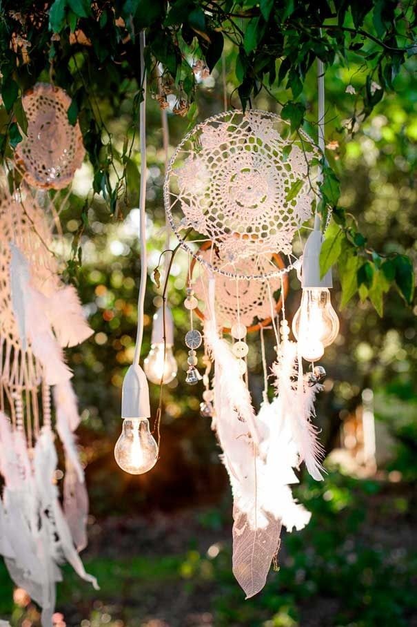 Love this mix of dreamcatchers and lighting.