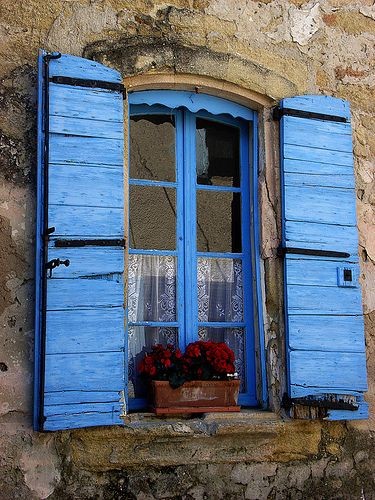 Blue window and window flower box!! Must be in Fra...