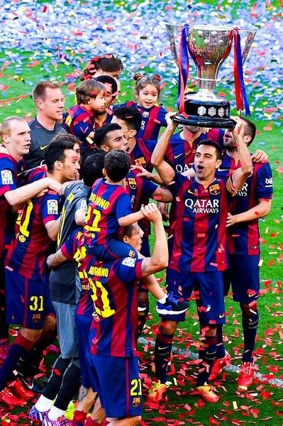 FC Barcelona players celebrate with La Liga trophy...