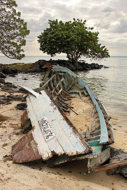 Boat wreck on the Mont Choisy, Mauritius beach by...