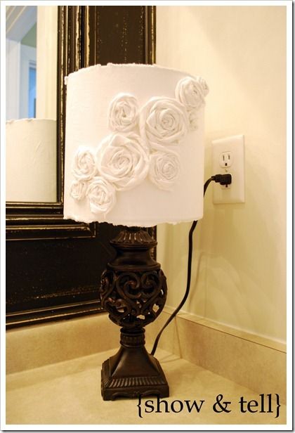 Lamp shade covered in white cotton and flowers mad...