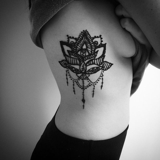 Lotus flower tattoo / henna on ribs
