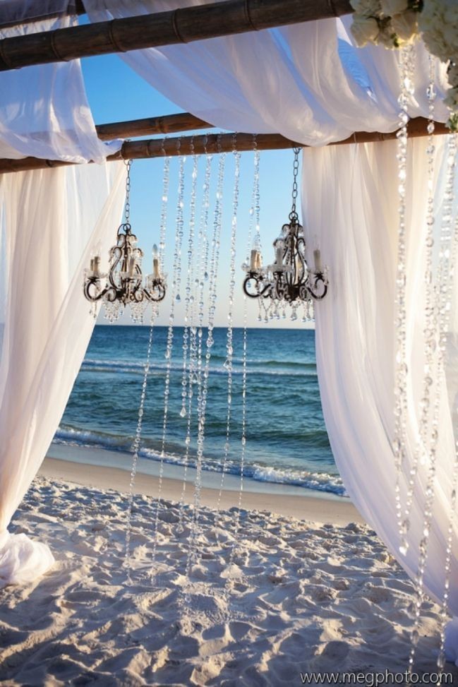 Again with the whole "magical beach wedding" look....
