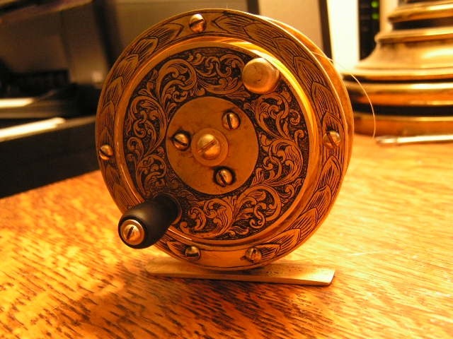Beautiful handmade and engraved brass reel.