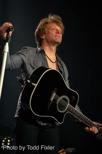 Jon Bon Jovi - Looking out at the audience while h...