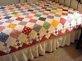 Adorable scrappy diamond patch quilt, love the 9pa...