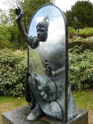 "Alice Through The Looking Glass". This sculpture...