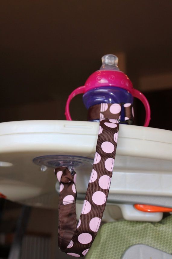 This sippy-cup leash keeps it from tumbling to the...
