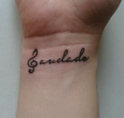 Saudade tattoo with a hint of music