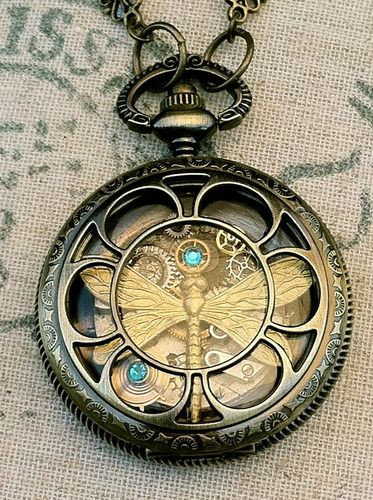Beautiful necklace made out of a pocket watch. #st...