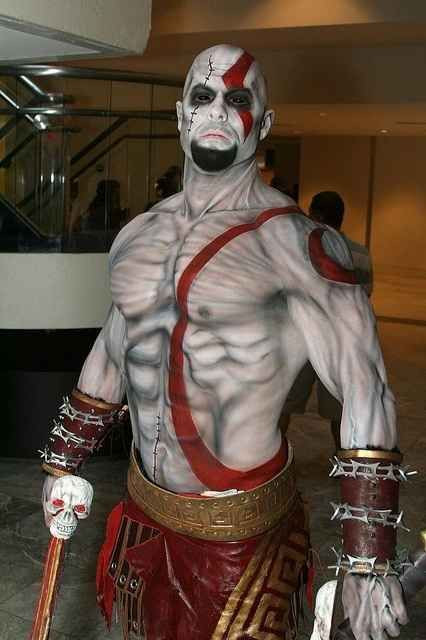 Kratos from God of War looking for Zeus by the esc...