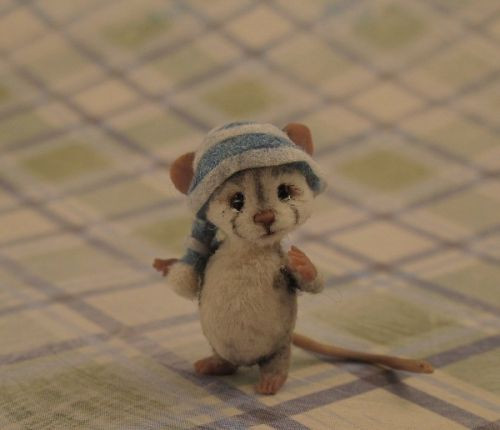 miniatures. Mouse. Cute but not real. We shall cal...