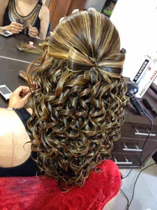WOW!!!! Amazing bow made out of hair anddddd curls...