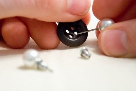 Use a button to keep your earrings together.