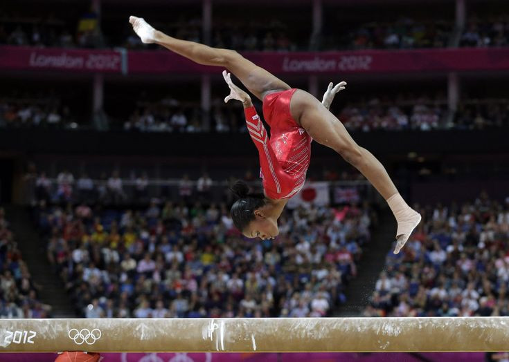 U.S. gymnast Gabrielle Douglas performs on the bal...